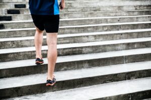 Man running on stairs, training